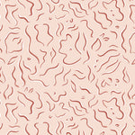 Detail of wallpaper in a painterly botanical print in rust and white on a light pink field.