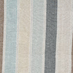 Detail of fabric in a global stripe print in shades of blue, tan, gray and brown.