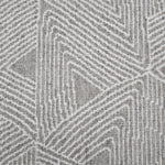 Broadloom carpet sample in a geometric linear pattern in cream on a light grey field.