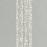 Detail of a linen fabric in a scrolling floral stripe pattern in cream on a light blue-gray field.
