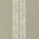 Detail of a linen fabric in a scrolling floral stripe pattern in cream on a light sage field.