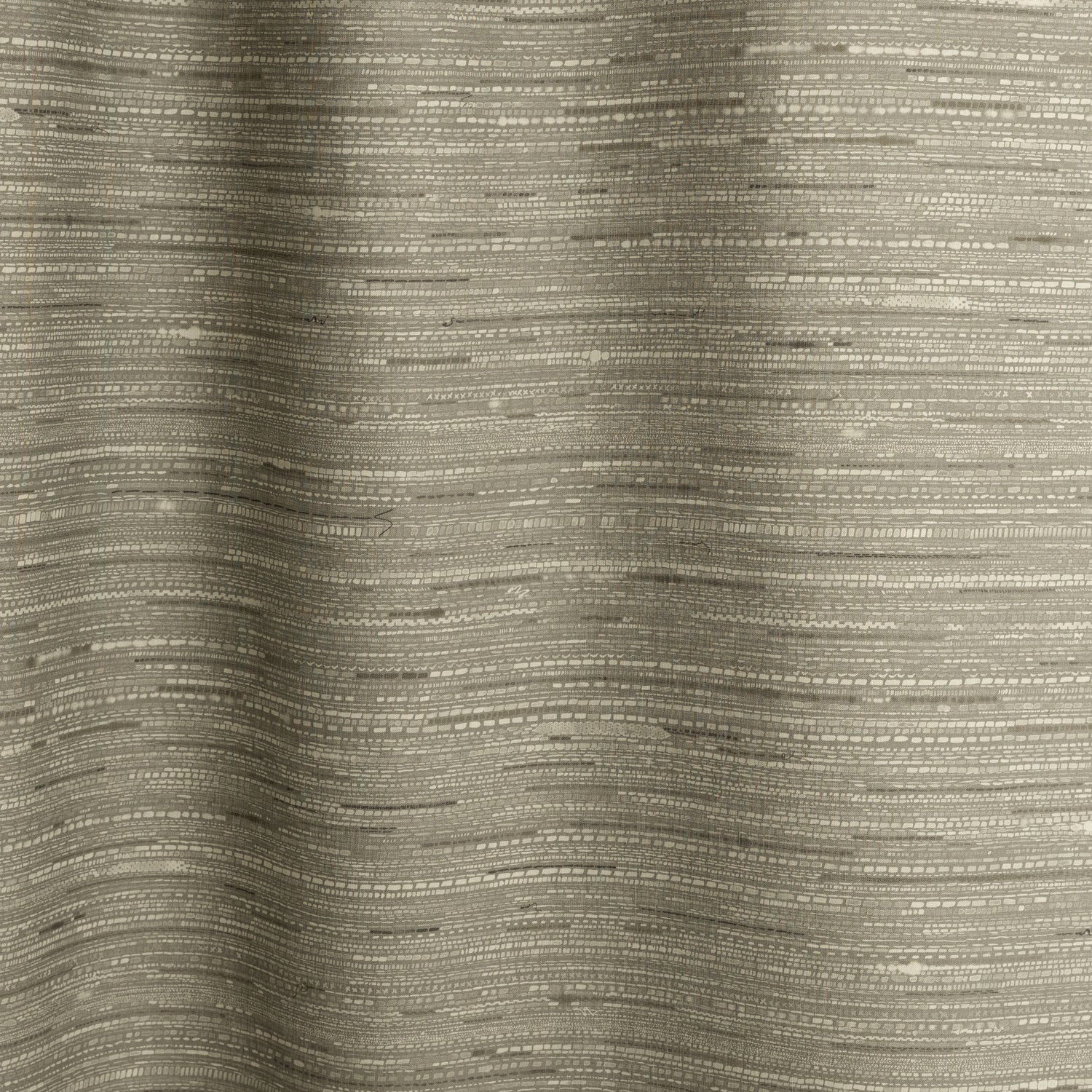 Gently draped fabric in a textural striped pattern in shades of muted olive green. 