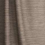Gently draped fabric in a textural striped pattern in shades of charcoal grey on on a white background.