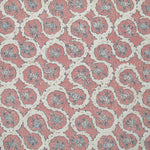 Detail of fabric in a meandering floral grid print in cream and navy on a light pink field.