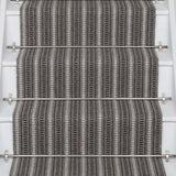 Striped flatweave runner in grey and black on white staircase