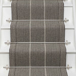 Striped flatweave runner in grey and black on white staircase
