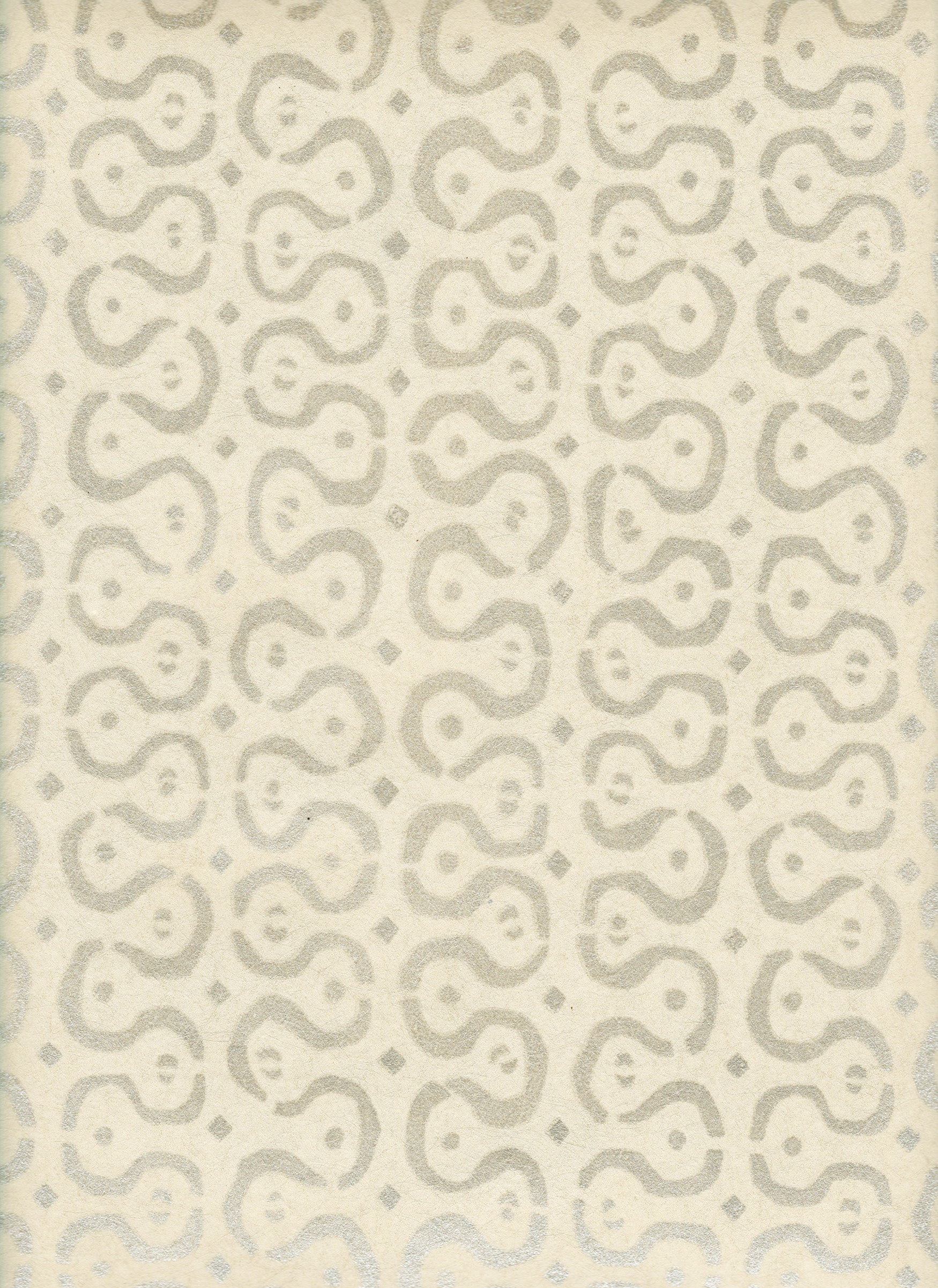 Detail of wallpaper in a curvilinear stripe pattern in gray on a cream field.