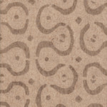 Detail of wallpaper in a curvilinear stripe pattern in brown on a light brown field.