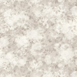 Detail of wallpaper in a painterly leaf print in shades of pinky grey with a mottled white overlay.
