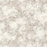 Detail of wallpaper in a painterly leaf print in shades of pinky grey with a mottled white overlay.
