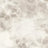 Close up detail of wallpaper in a painterly leaf print in shades of pinky grey with a mottled white overlay.