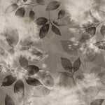 Close up detail wallpaper in a painterly leaf print in shades of warm charcoal grey with a mottled white overlay.