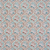 Detail of fabric in a floral damask print in shades of blue and brown on a cream field.