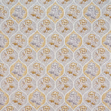 Detail of fabric in a floral damask print in shades of gray and mustard on a cream field.