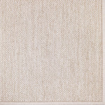 Broadloom carpet in a textural weave in beige. 