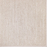 Broadloom carpet in a textural weave in beige. 