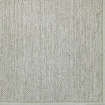 Broadloom carpet in a textural weave in sage green.
