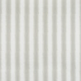 Detail of fabric in a textural speckled stripe print in greige and cream.