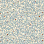 Wallpaper in a lyrical wildflower design in white with red accents on a blue field. 