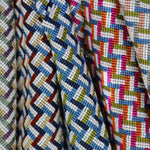 An array of woven stair step patterned fabrics.
