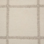 Broadloom carpet swatch in a checkered pattern in a cream design