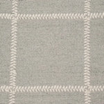 Broadloom carpet swatch in a checkered pattern in a light grey design