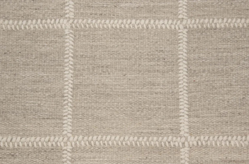Broadloom carpet swatch in a checkered pattern in a light grey design