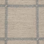 Broadloom carpet swatch in a checkered pattern in a grey blue design