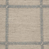 Broadloom carpet swatch in a checkered pattern in a grey blue design