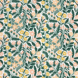 Detail of fabric in a small-scale floral print in green, yellow and coral on a white field.