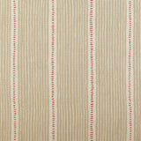 Detail of fabric in a repeating stripe and dash pattern in tan and red on a cream field.