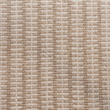 Broadloom carpet in a ticking stripe in shades of warm tan and cream. 
