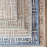 Stack of broadloom carpet samples in a range of colors. 