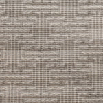 Broadloom carpet in a geometric stripe in cream and taupe. 