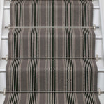 Striped flatweave runner in grey and black on white staircase