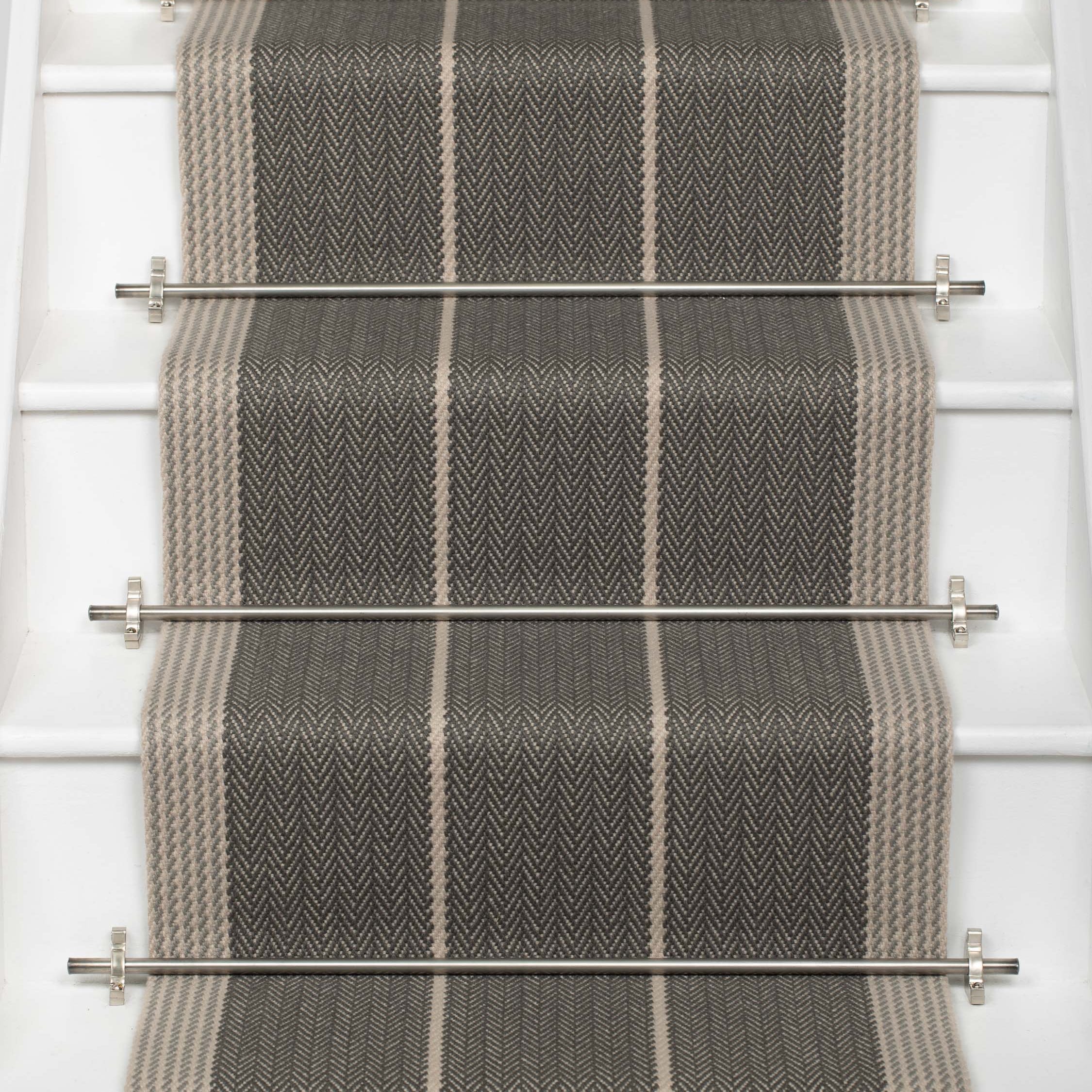 Striped flatweave runner in dark grey and light grey on white staircase