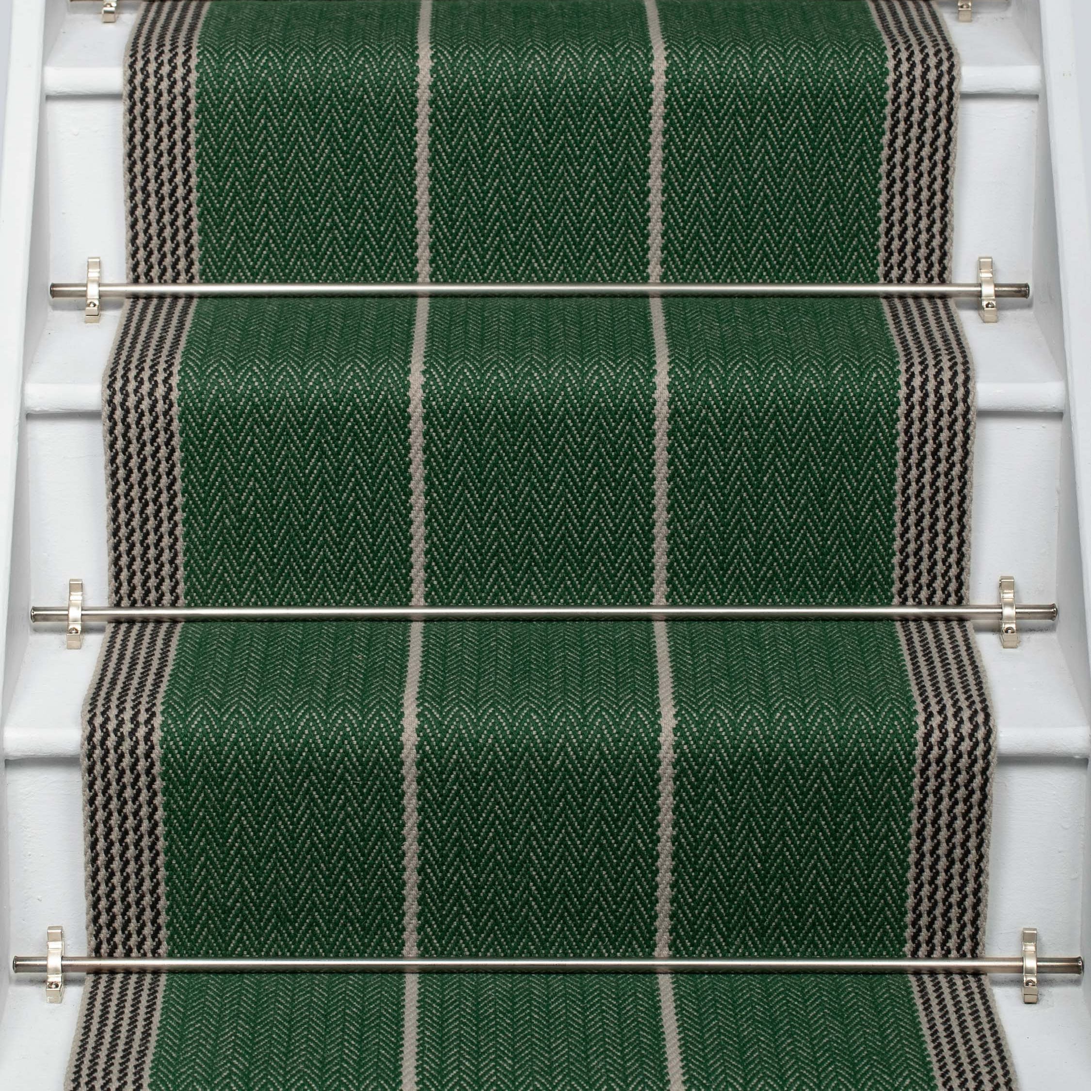 Striped flatweave runner in green and grey on white staircase