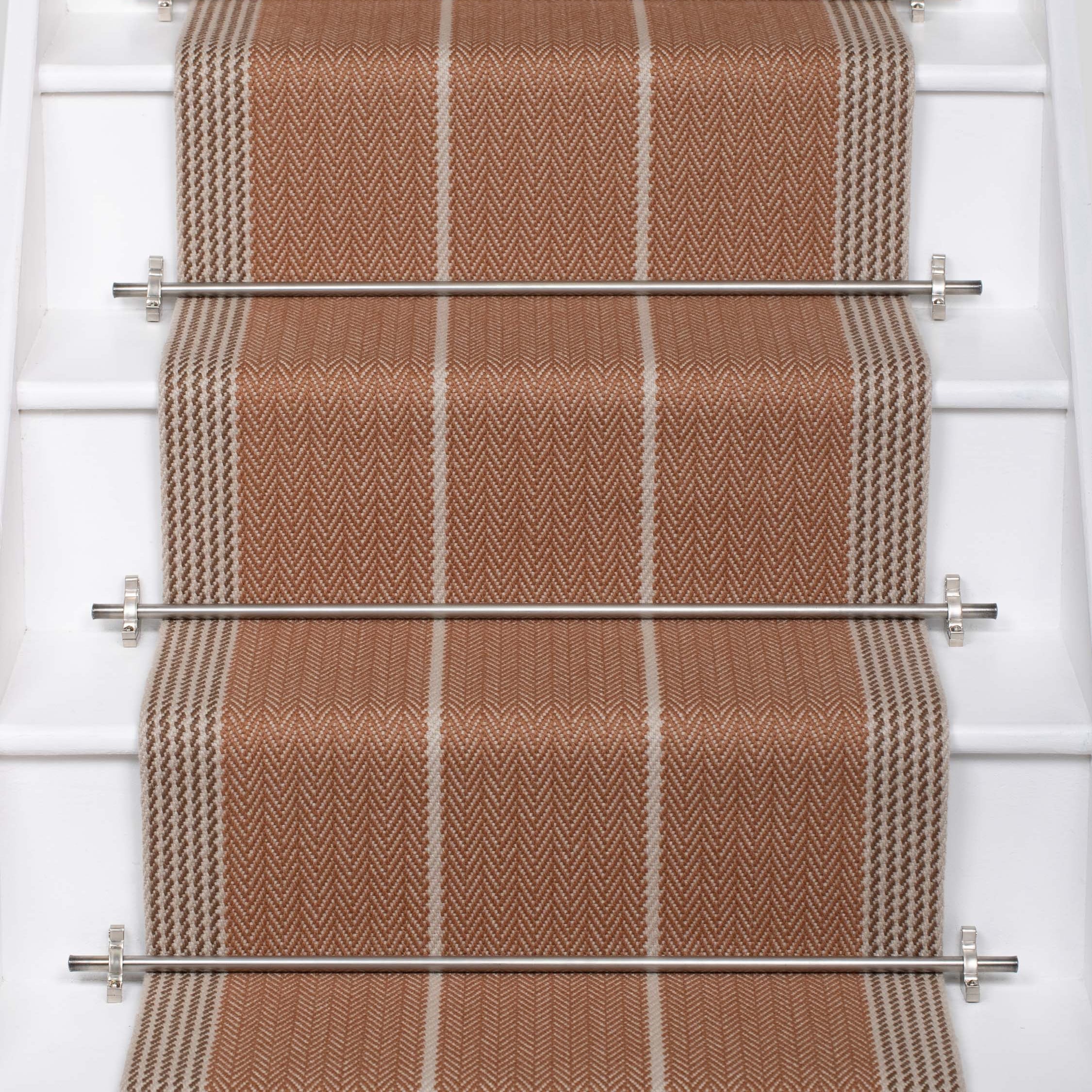 Striped flatweave runner in tan and grey on white staircase
