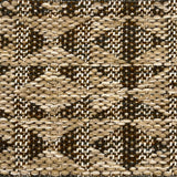 Close-up of a woven rug with geometric pattern in shades of tan and brown.