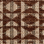 Close-up of a woven rug with geometric pattern in shades of brown.