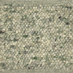 Close-up of nubby textured green handmade rg