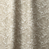 Playful wave print in white on a pale grey-green watercolor field.
