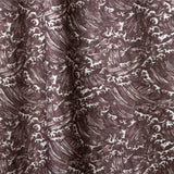 Playful wave print in white on a warm dark grey watercolor field.