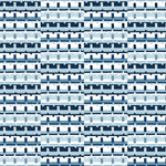 Detail of wallpaper in a playful geometric grid print in shades of blue, navy and white.