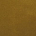Detail of velvet fabric yardage in golden brown.