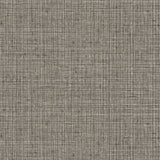 Detail of fabric in a textured tweed pattern in shades of gray.