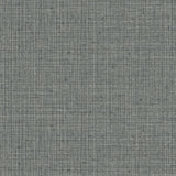 Detail of wallpaper in a textured tweed pattern in shades of gray-green.