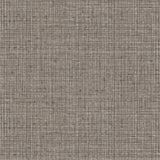Detail of wallpaper in a textured tweed pattern in shades of brown and gray.