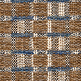 A close-up of a woven rug featuring a brown and beige plaid design with blue accents.