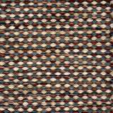 Textured handwoven carpet with a mix of brown, red, cream and blue.